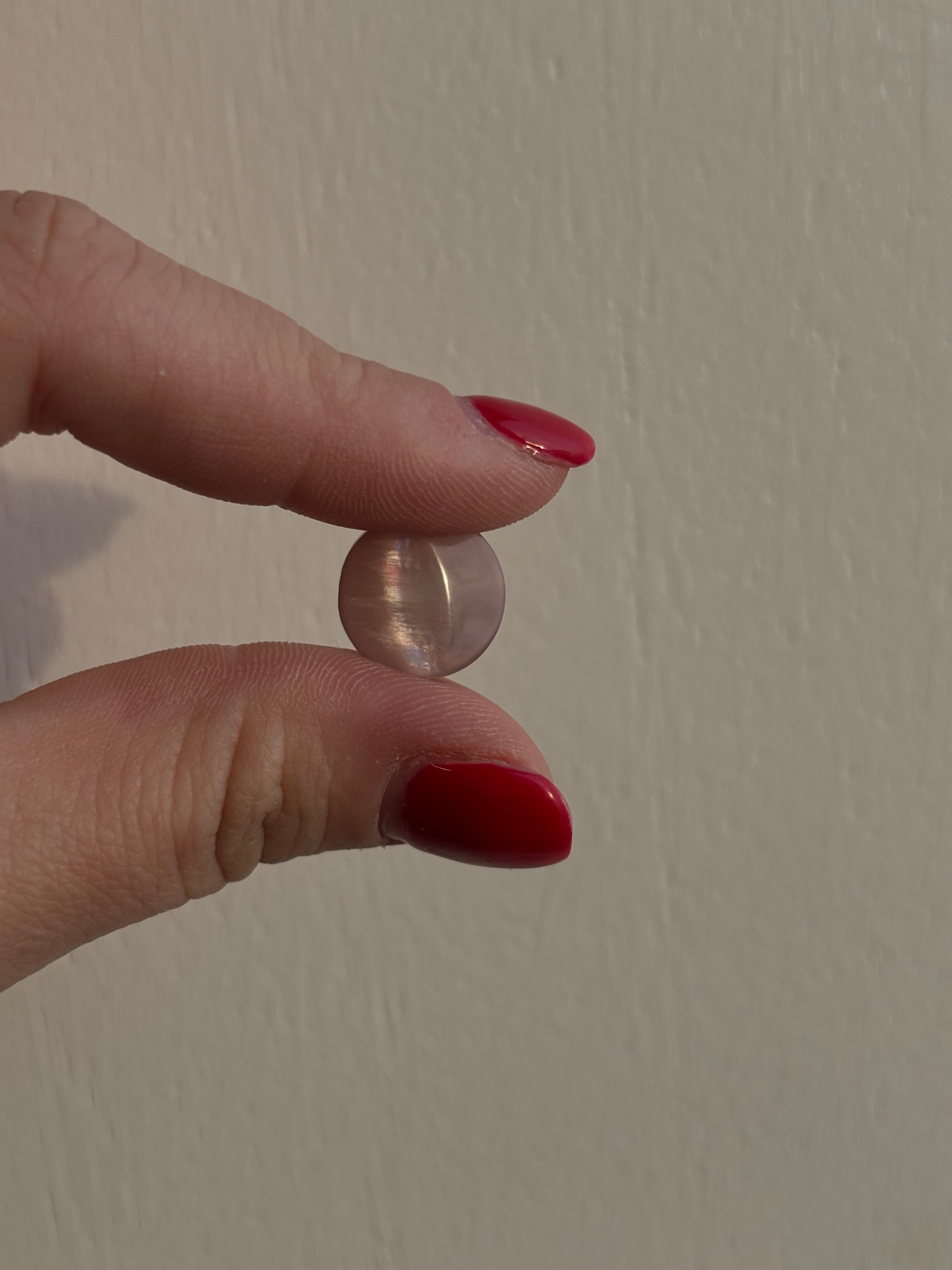 Plasthnappar bleikir