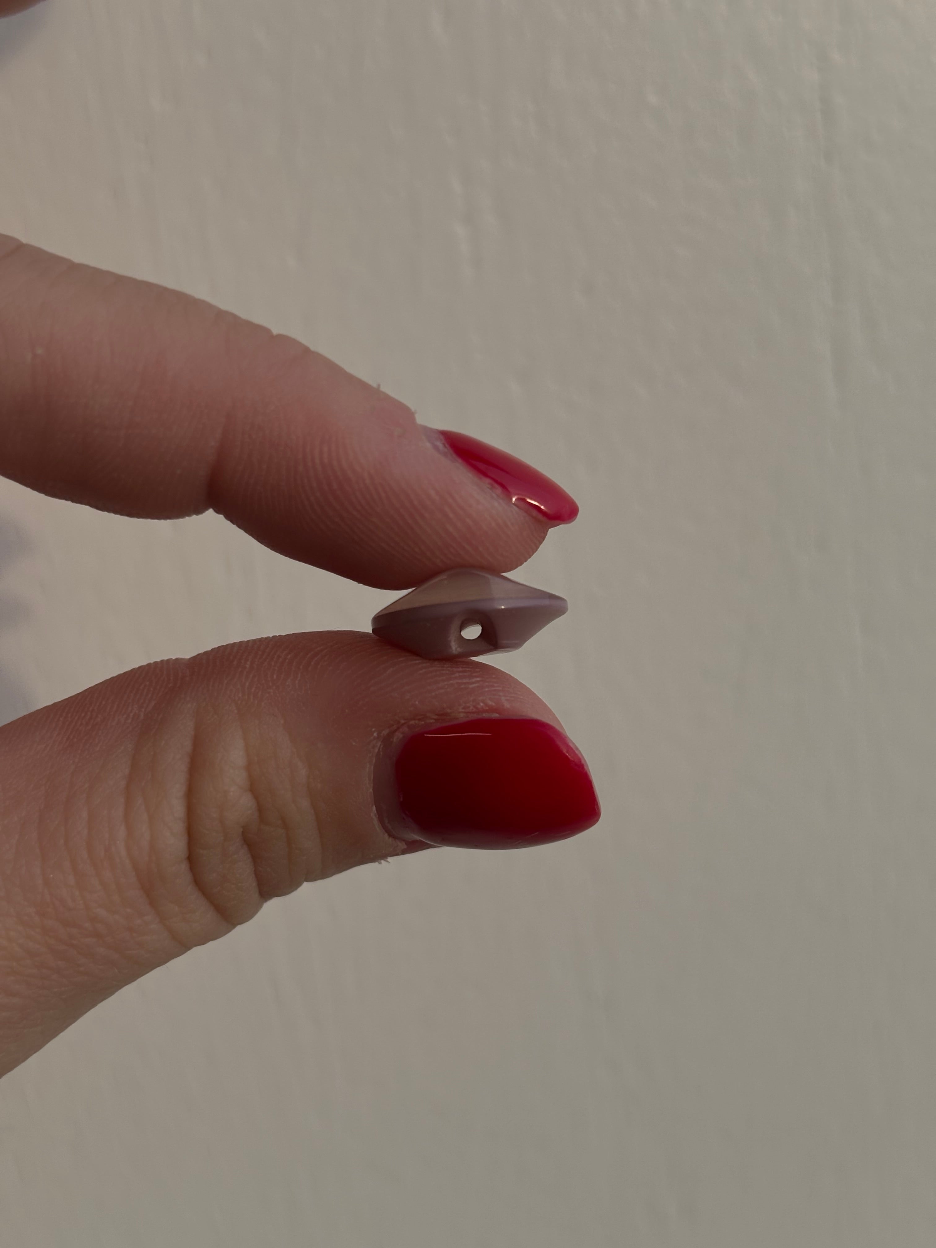 Plasthnappar bleikir